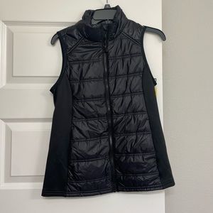 black brand new athletic vest with tags